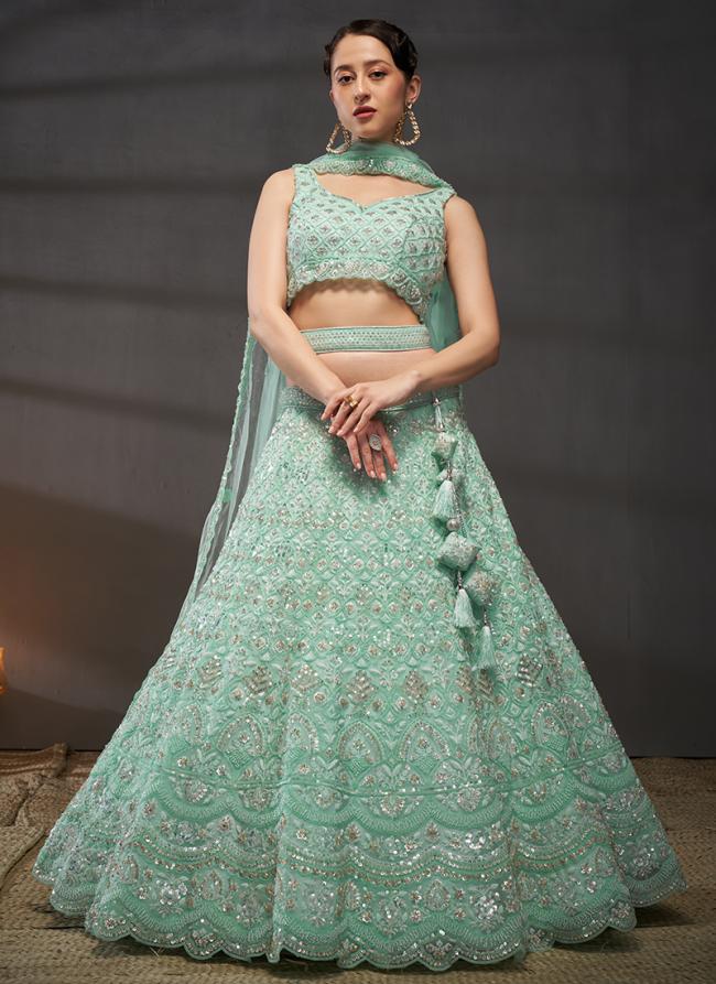 Net Turquoise Blue Bridal Wear Sequins Work Lehenga Choli